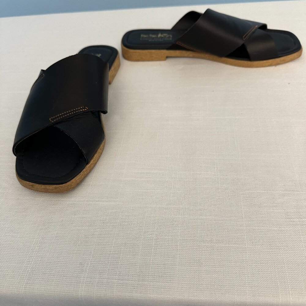 Coach and four black sandals